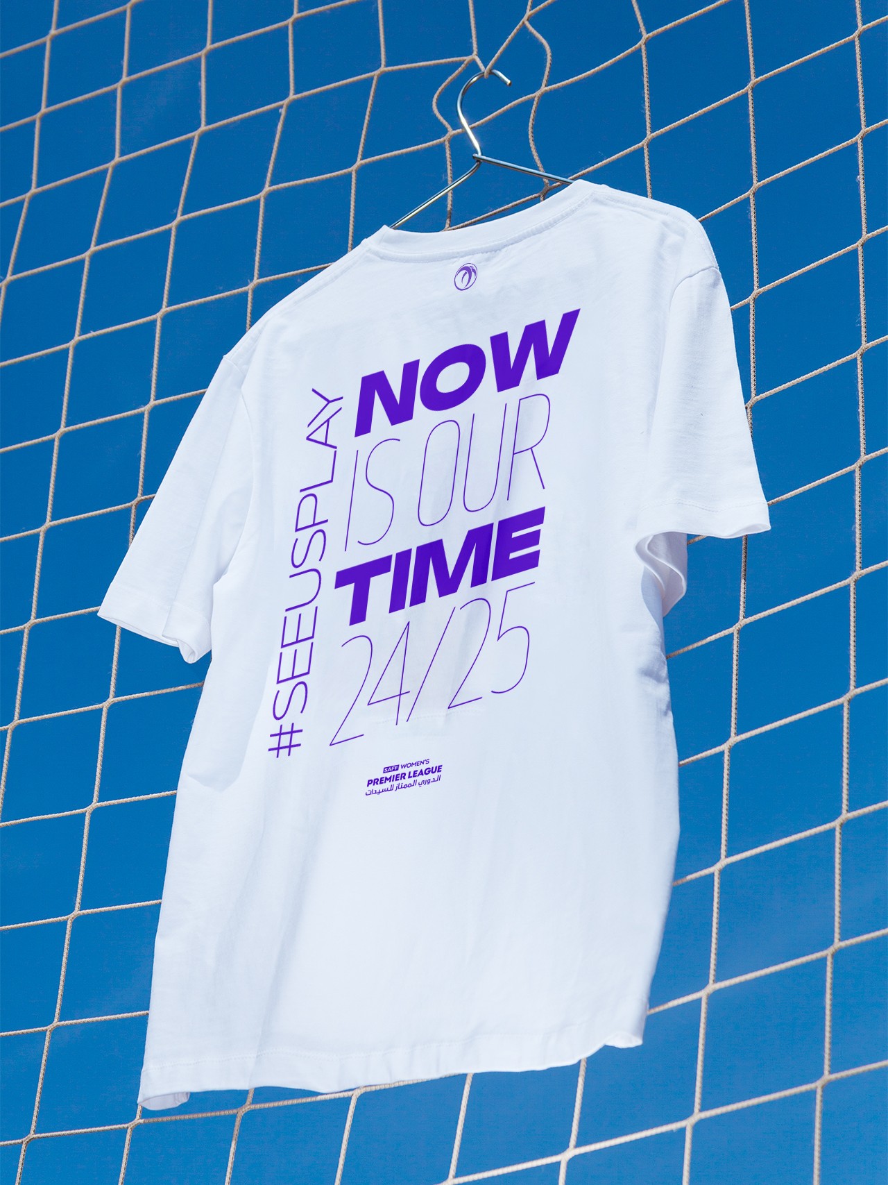 Graphic depicting a hexagonal cropped photo of an interior room design with grid lines along its borders.