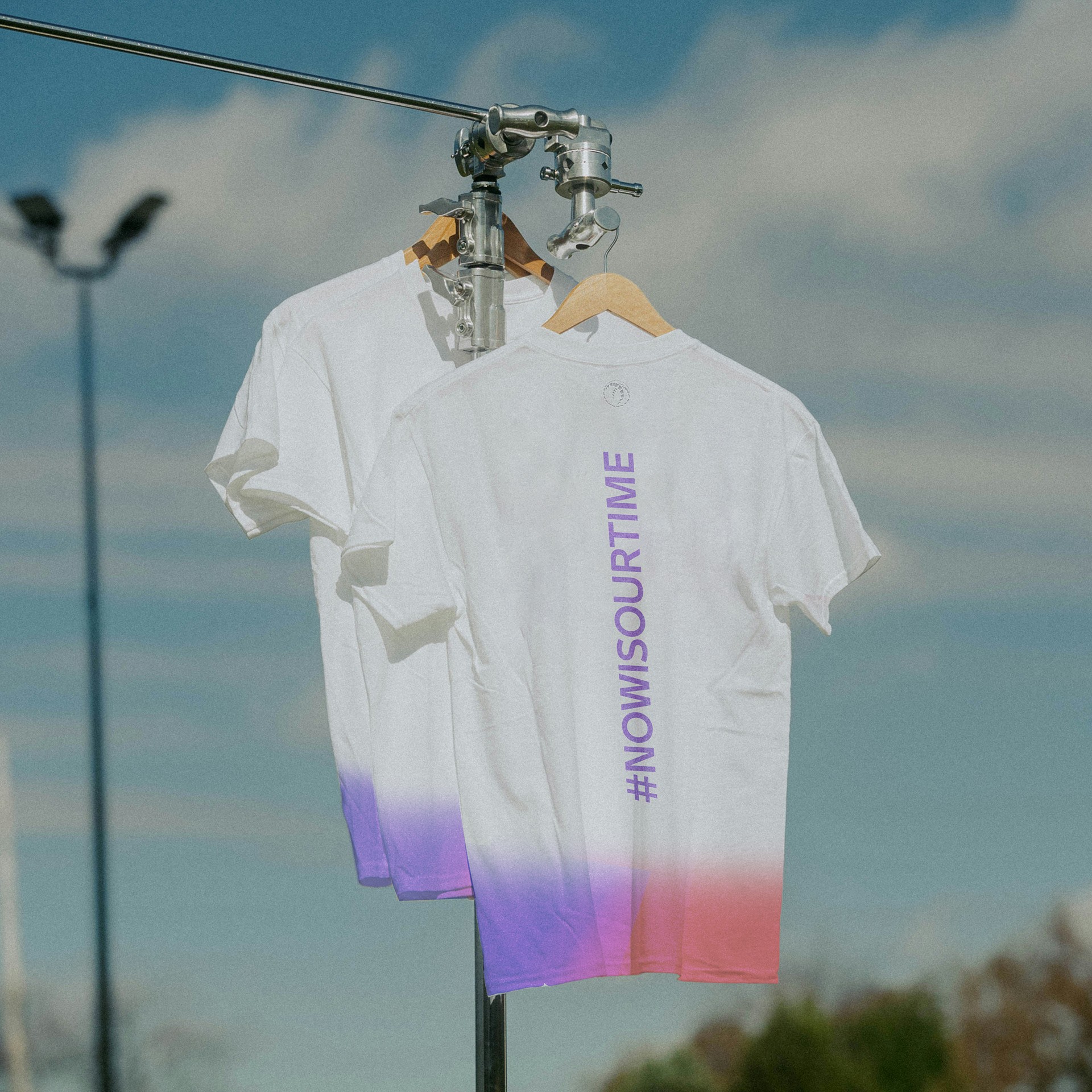 Graphic of a typography specimen showing the alphabet and numerals on top of a dark gray background.