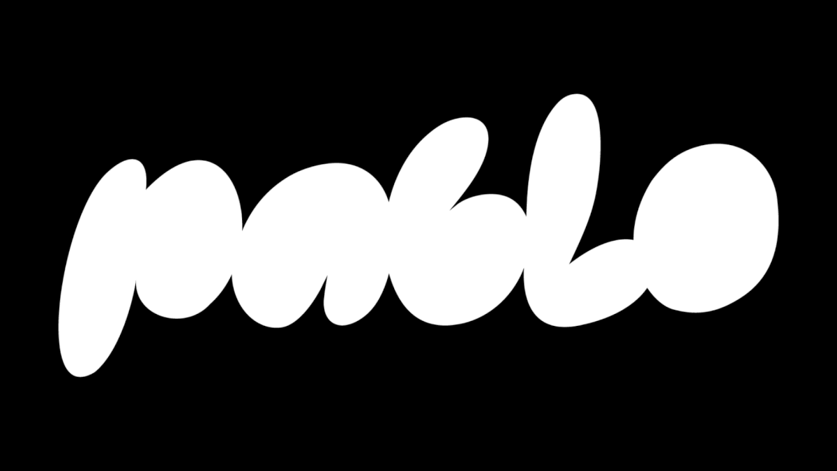 Graphic depicting a hexagonal cropped photo of an interior room design with grid lines along its borders.