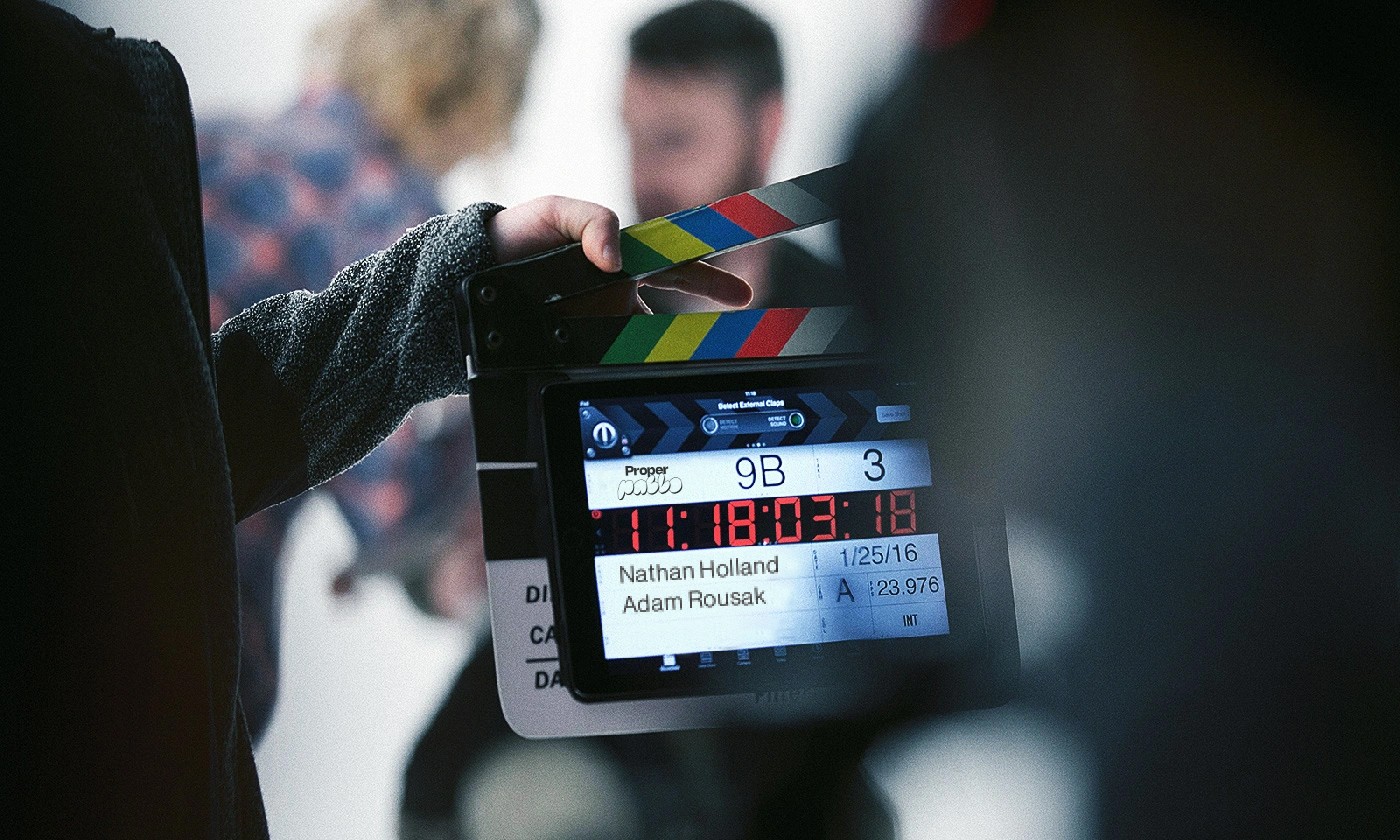 Graphic depicting UI-styled buttons with different categories of interior design items on top of an image of a modern interior living room.